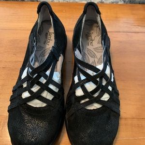 Black leather flats with a hint of sparkle